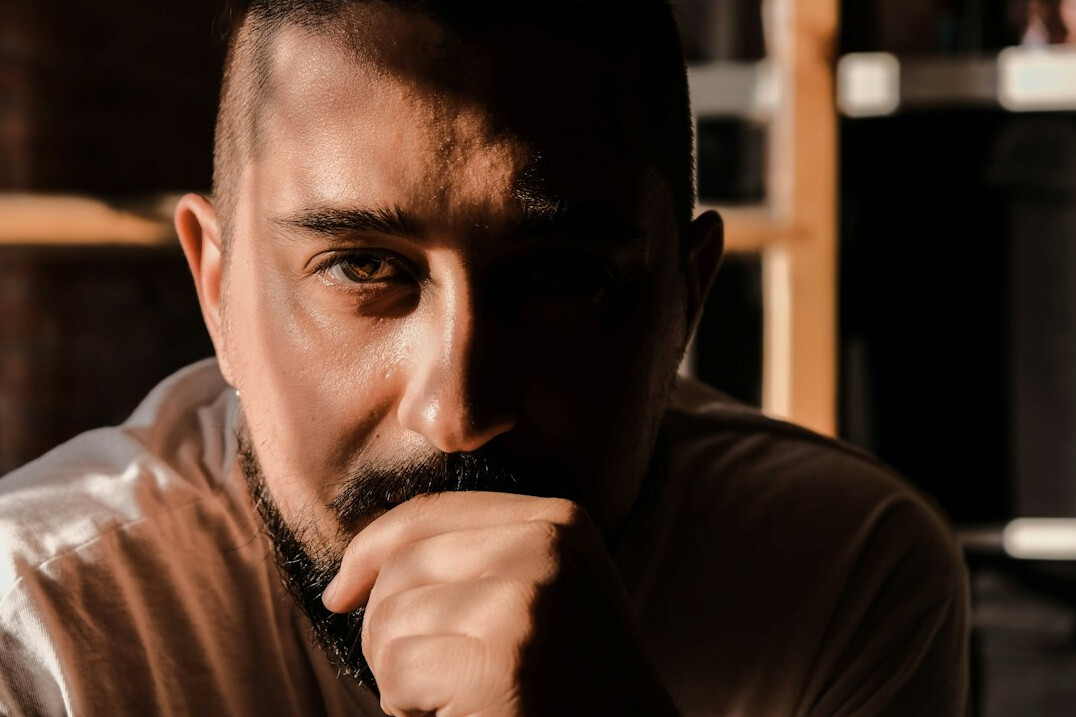 Portrait of a bearded man looking at the camera